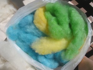 Hand carded and dyed wool, ready for felting